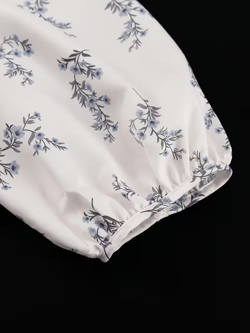 Women's French-Style Classic Elegant Set: Puff Sleeve Blouse with Small High Neck and Ruffle Trim, Printed Shorts Set