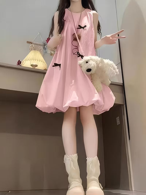 Charming Pink Sleeveless Bubble Skirt Dress with a Cute Black Bow Decoration, Featuring a Relaxed Fit That Gives a Youthful Appearance