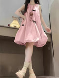 Charming Pink Sleeveless Bubble Skirt Dress with a Cute Black Bow Decoration, Featuring a Relaxed Fit That Gives a Youthful Appearance